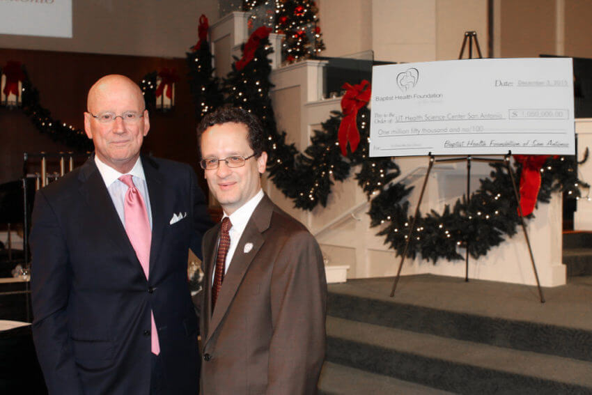 Health Science Center President William L. Henrich, M.D. (left) poses with Cody Knowlton, president and CEO of the Baptist Health Foundation of San Antonio.