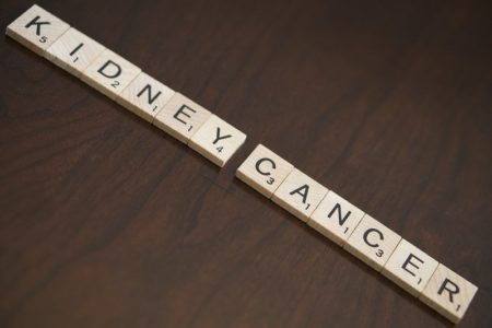 Scrabble pieces spelling out kidney cancer