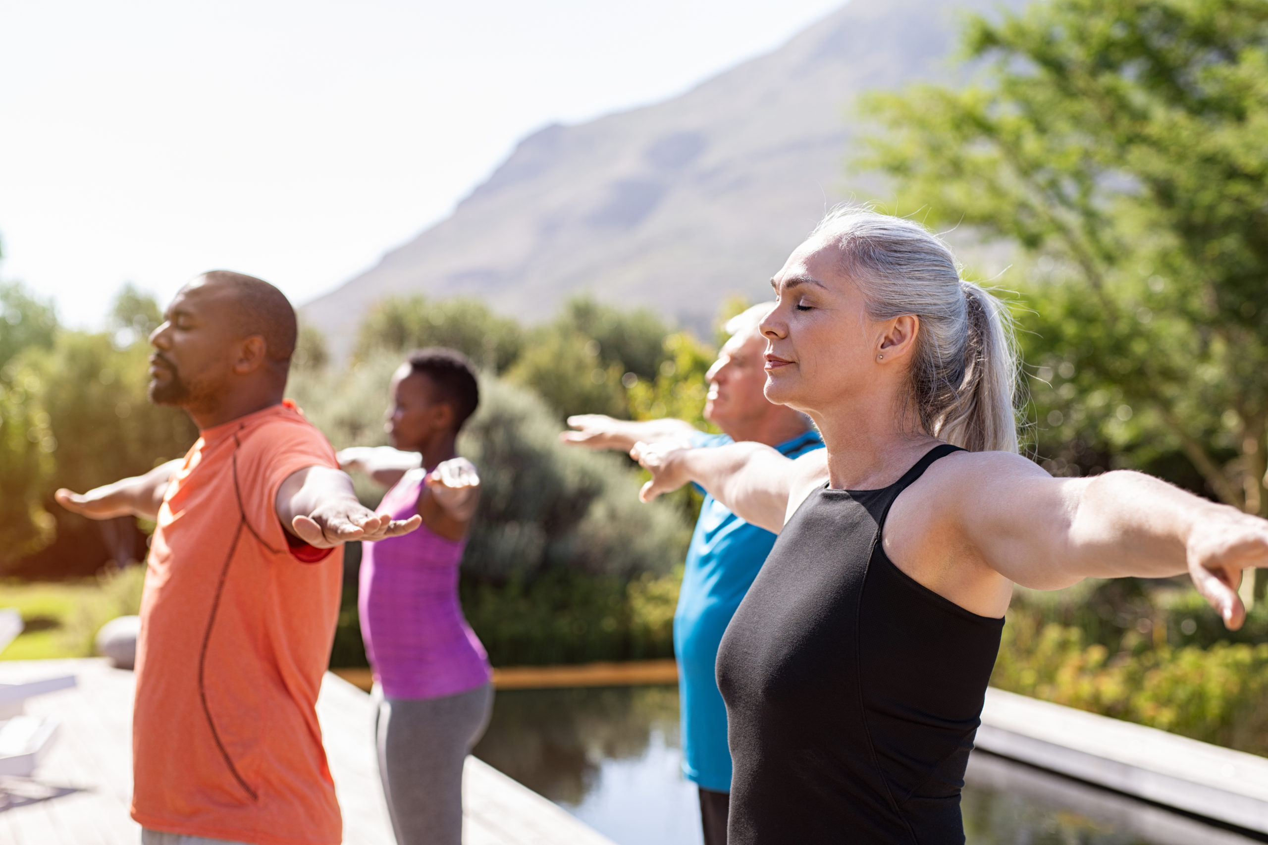 Group of adults doing yoga