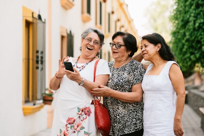 Photo of 3 senior ladies laughing