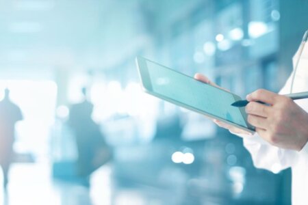 photo of physician with a tablet