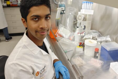 Photo of Arhan Rao, 17, in Research Lab at UT Health San Antonio
