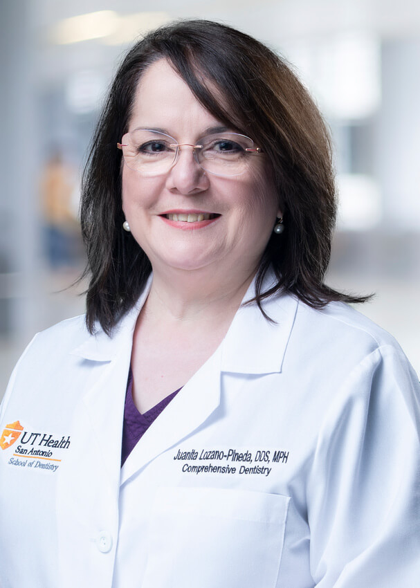 Head and shoulders photo of Dr. Pineda in her UT Health San Antonio white coat.