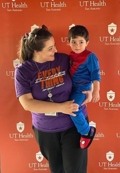 Afaf Saliba Jaafar, soon-to-be graduate of the Graduate School of Biomedical Sciences, with her youngest son 