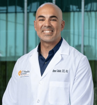 Ahmed Sabbah in his white coat.