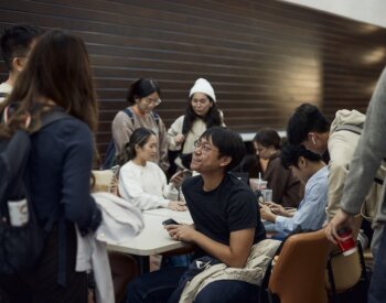Students gather in an indoor common space on the UT San Antonio Health Science Center campus.