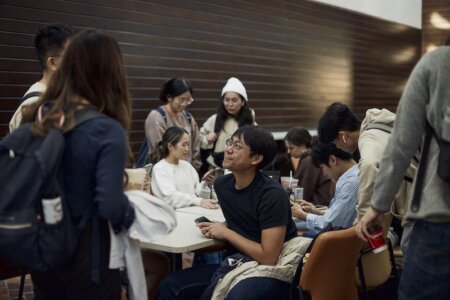 Students gather in an indoor common space on the UT San Antonio Health Science Center campus.