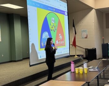 Doctor of Occupational Therapy student Grace McGuire presents to elementary students as part of her capstone project.