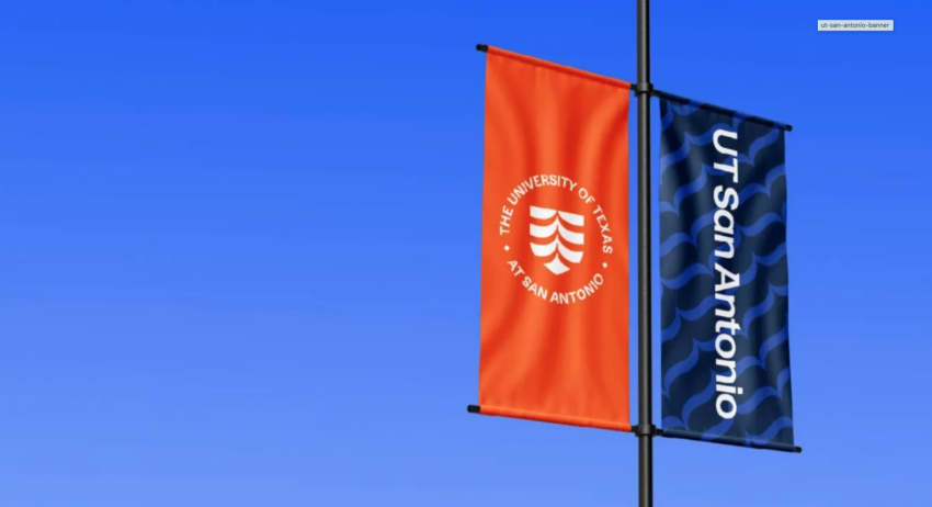 UT San Antonio banners fly on light pole.