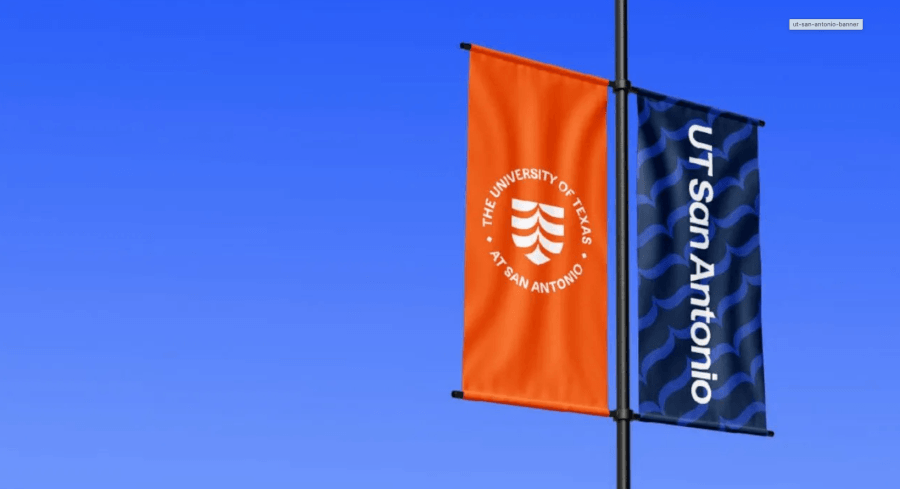 UT San Antonio banners fly on light pole.