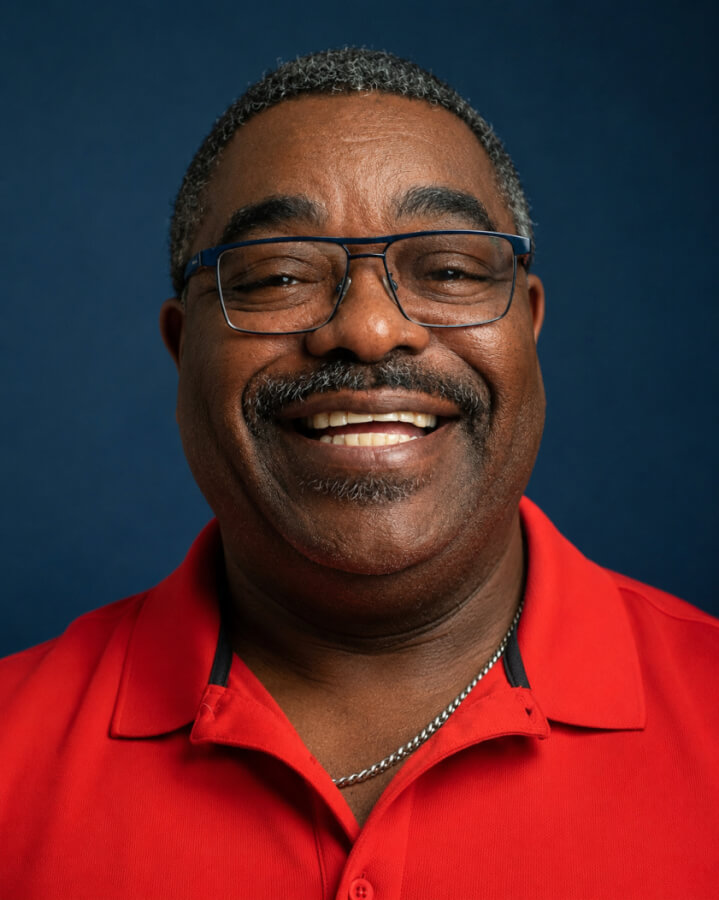 A photo of Walter Lewis smiling.
