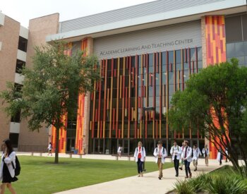Students walking at the Health Science Center.