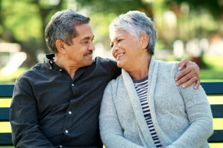 Image of older couple together outdoors.